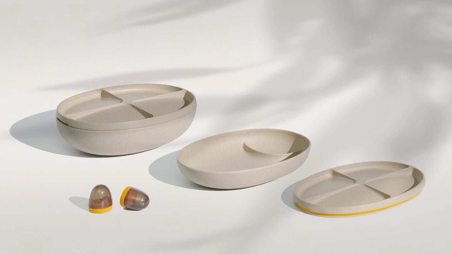 Set of rice husk bowls with different designs on a light background
