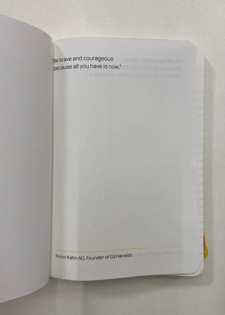Open book with a quote on a white background
