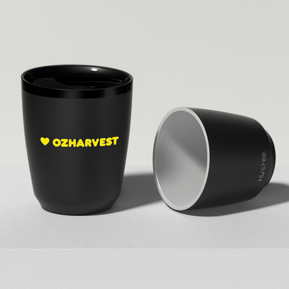 Black cup with 'OZHAVENST' text and another black cup on a light gray background